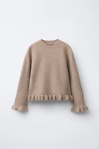 PULL EN MAILLE À VOLANTS