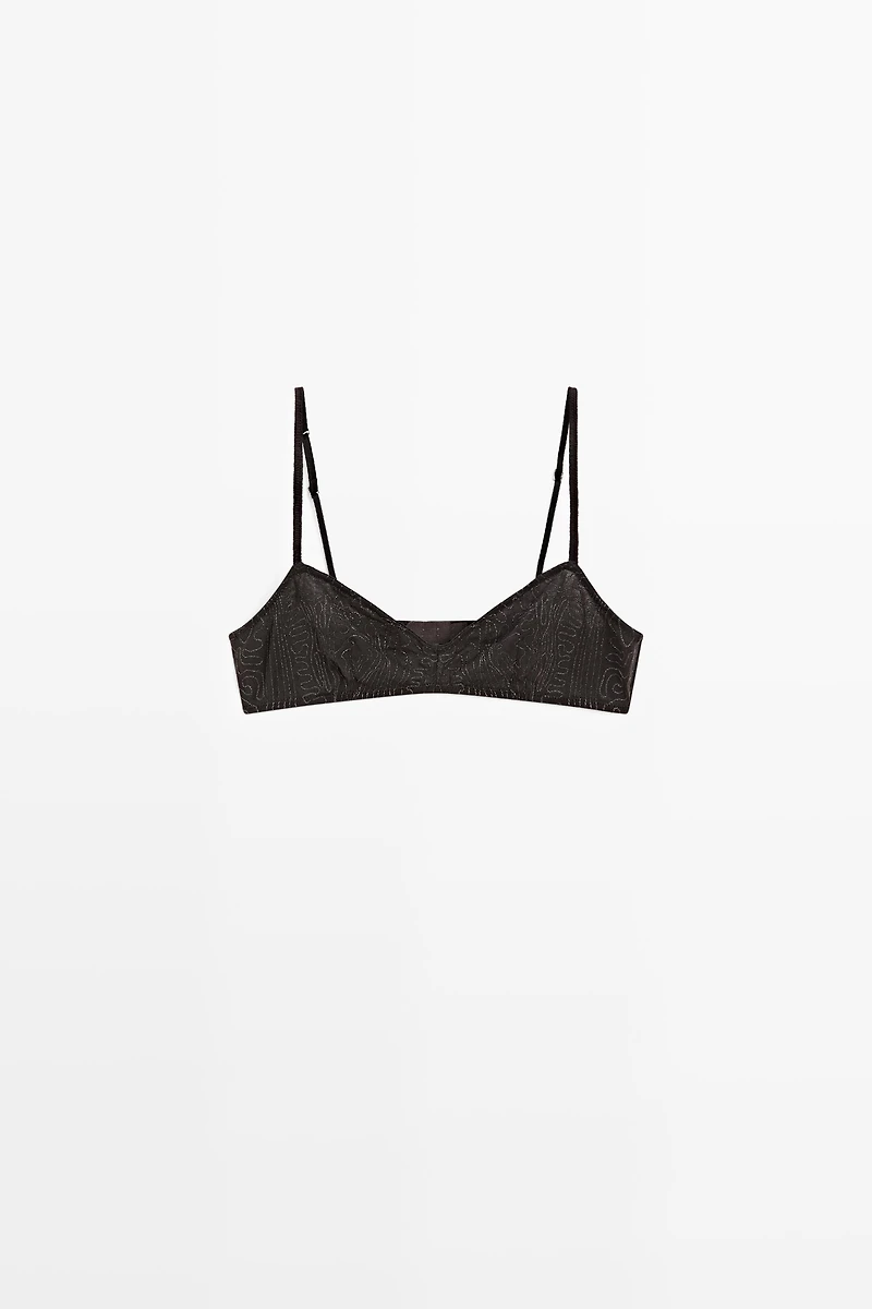 Top with embroidered detail