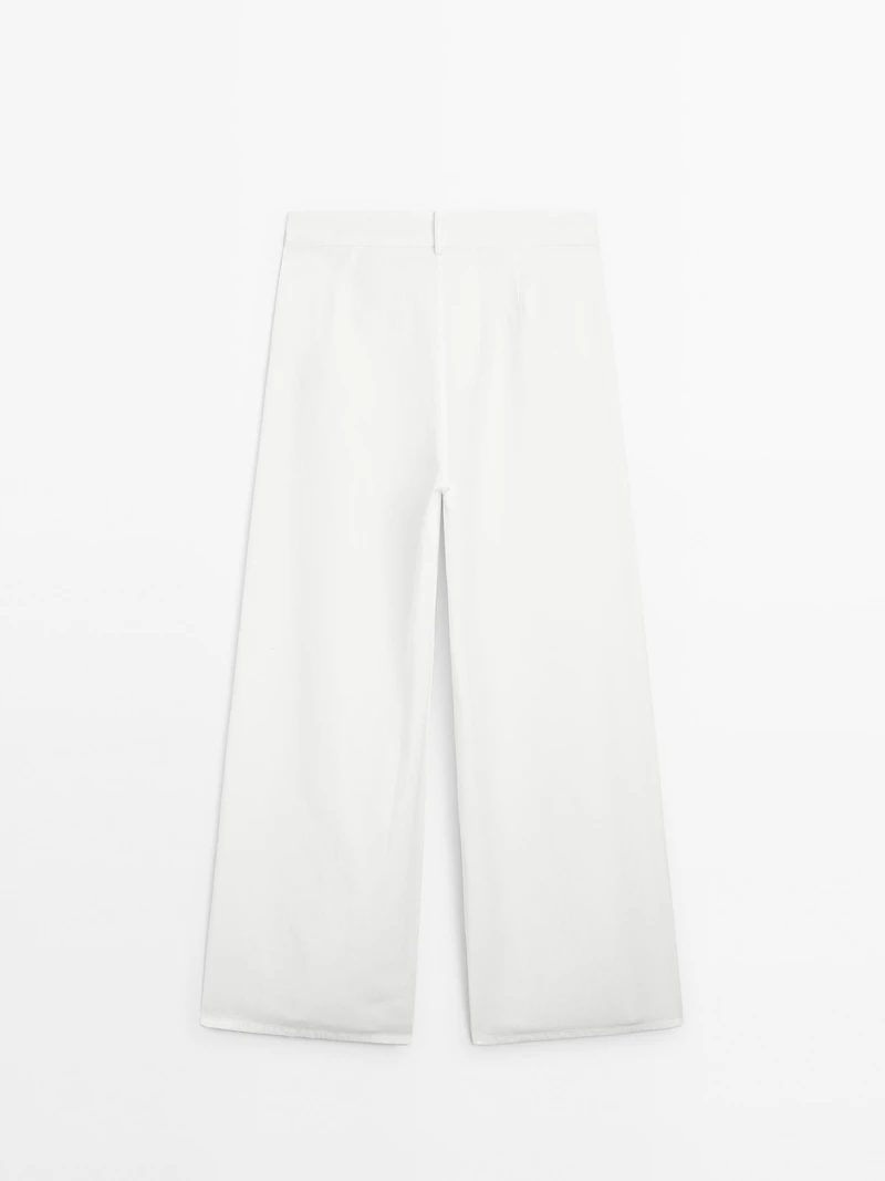 Flowing barrel fit trousers with seam detail