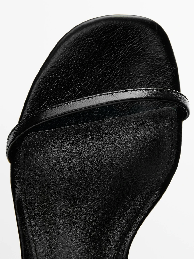 Sandale en cuir à brides compensées