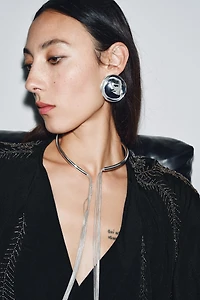 BOUCLES D'OREILLES MÉTALLIQUES PLAQUE