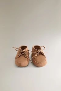 CHAUSSON BOTTE LACETS CUIR