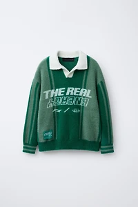 PULL POLO EN MAILLE EFFET FOURRURE AVEC INSCRIPTION