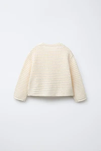 PULL EN MAILLE À FLEURS