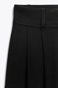 FLAP PLEATED PANTS
