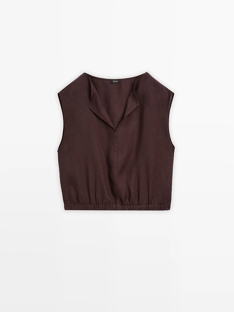 Linen blouse with elasticated hem