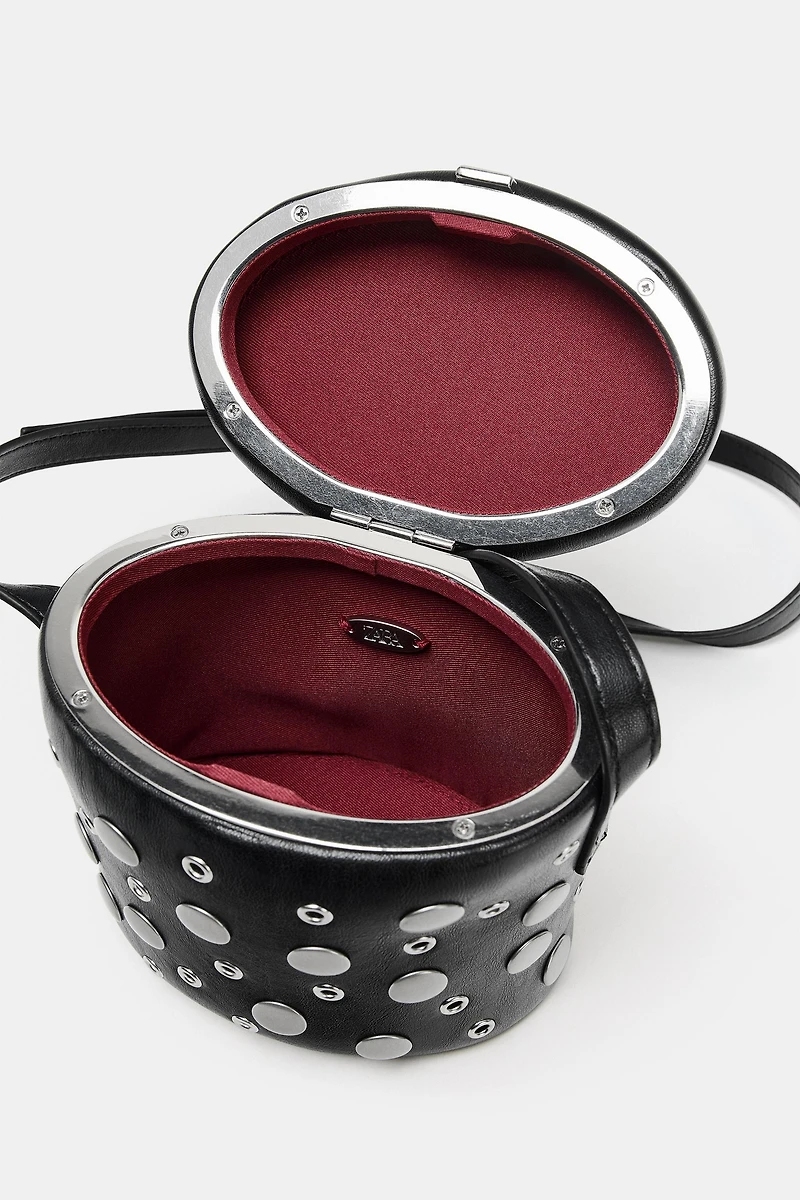 STUDDED VANITY BAG