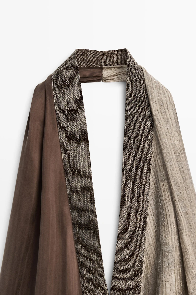 Flowing wrap top with mixed fabric detail