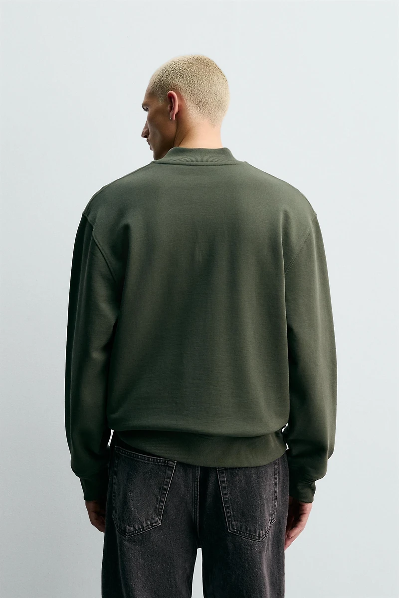 QUARTER-ZIP SWEATSHIRT