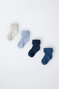 LOT DE QUATRE CHAUSSETTES COULEURS DANS UNE BOÎTE