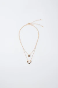TWO-PACK OF DOLPHIN AND HIBISCUS PENDANT NECKLACES