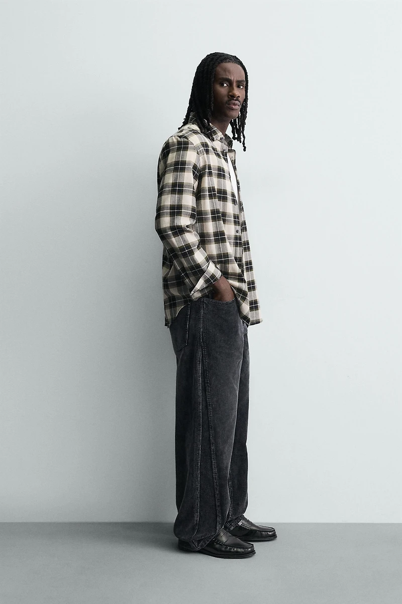 BAGGY FIT CORDUROY PANTS WITH TWISTED SEAMS