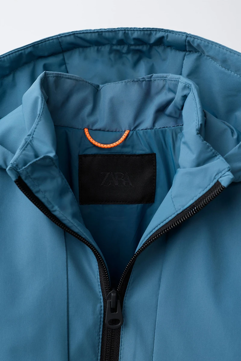 TECHNICAL WATER REPELLENT RAINCOAT