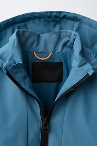 TECHNICAL WATER REPELLENT RAINCOAT