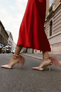 FEATHER HEELED SHOES