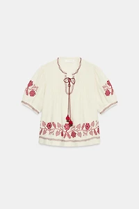 BLOUSE BRODERIES ET POMPONS