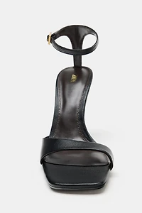 ASYMMETRIC LEATHER HEELED SANDALS