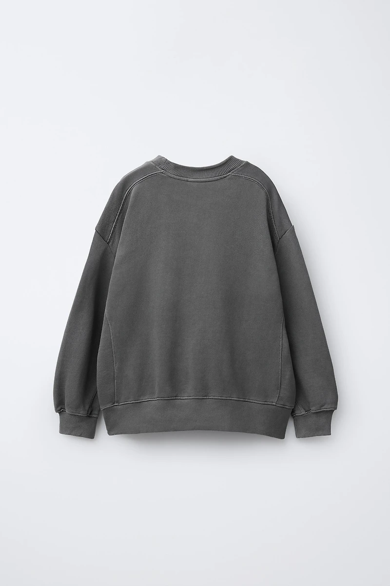SWEAT TEINT EN PIÈCE ÉTIQUETTE