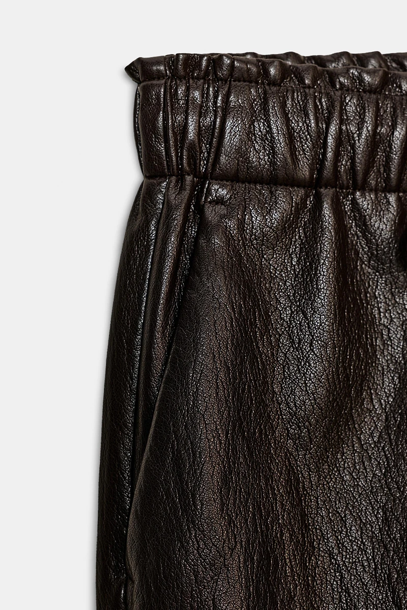 FAUX LEATHER ELASTIC WAIST PANTS