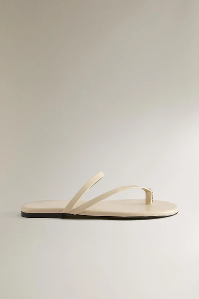 FLAT LEATHER SANDALS