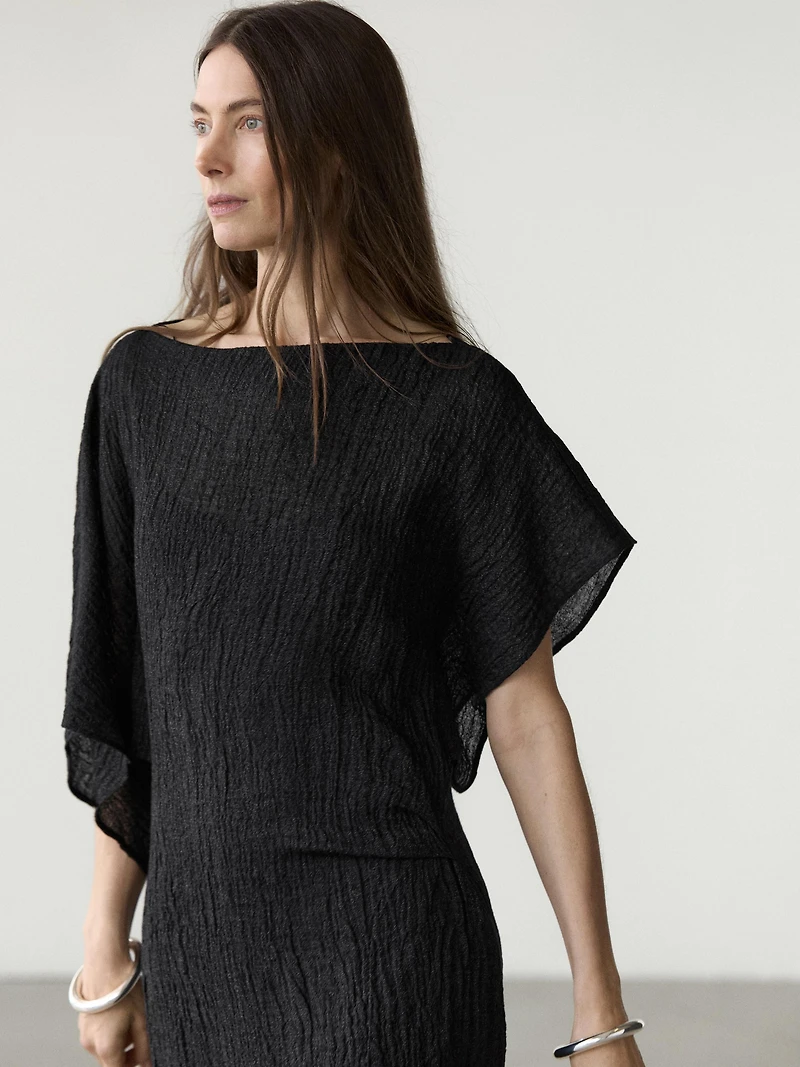 Linen midi dress with asymmetric sleeves