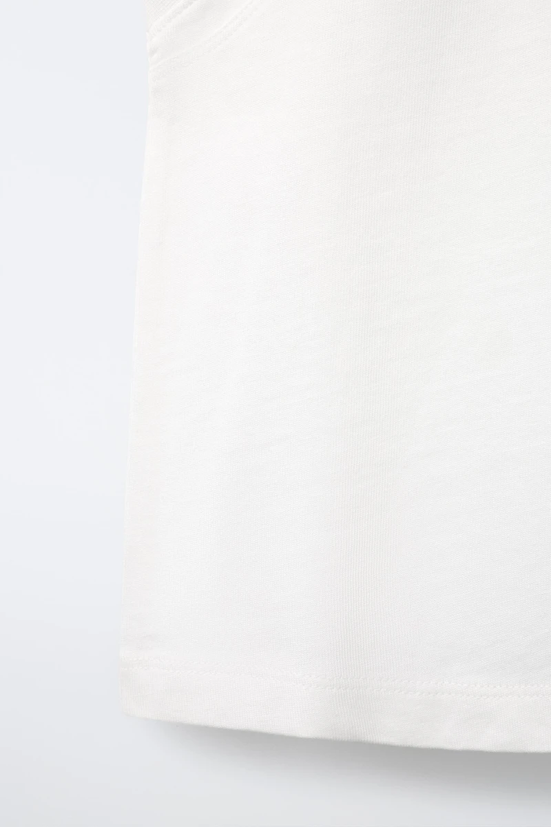 T-SHIRT UNI SANS MANCHES