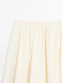 Jupe midi ample imprimée à rayures