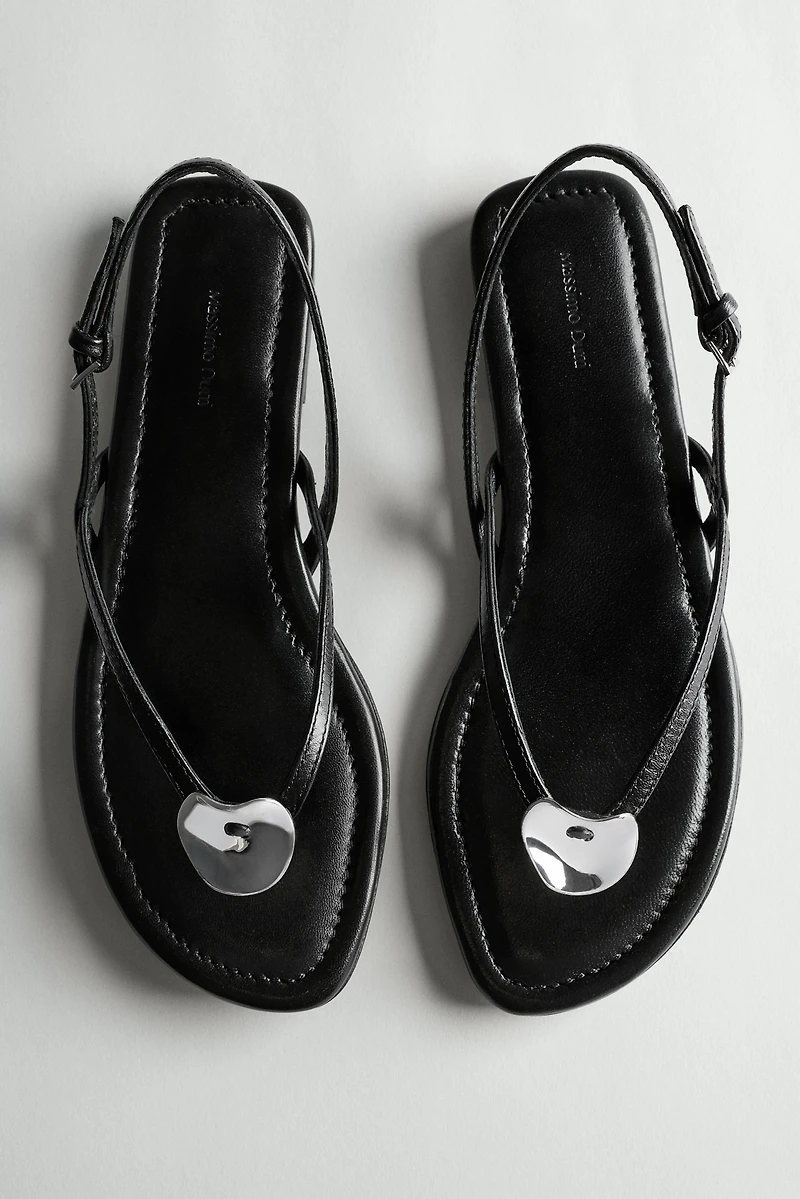 Flat slider sandals with gem detail