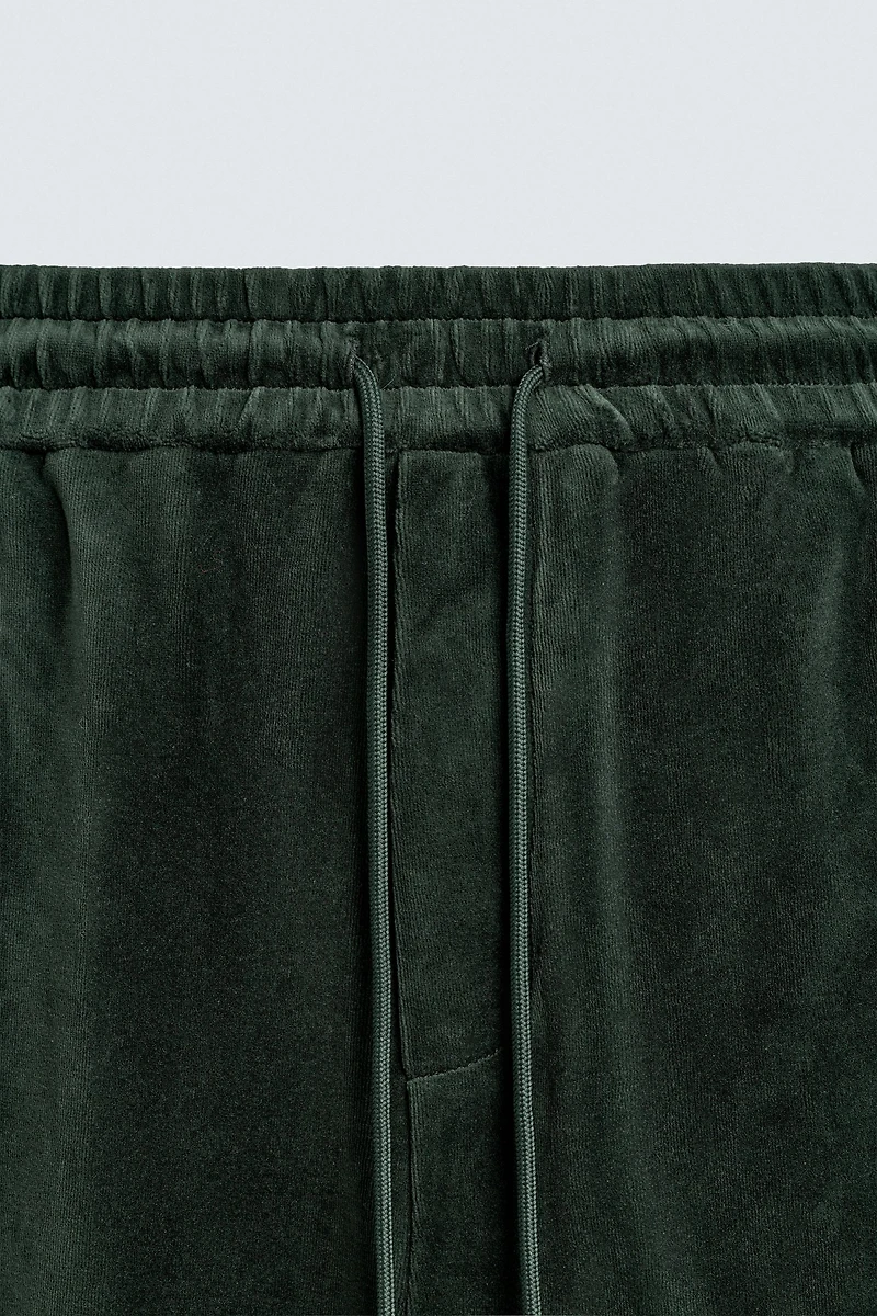 VELOUR PIPED PANTS