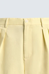 RELAXED FIT PLEATED SHORTS