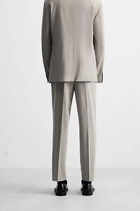 TEXTURED SUIT PANTS