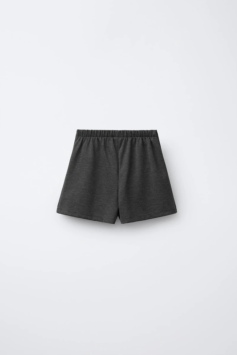 JUPE-SHORT À NŒUDS BRILLANTS