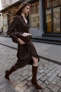 BUCKLED HEEL BOOTS