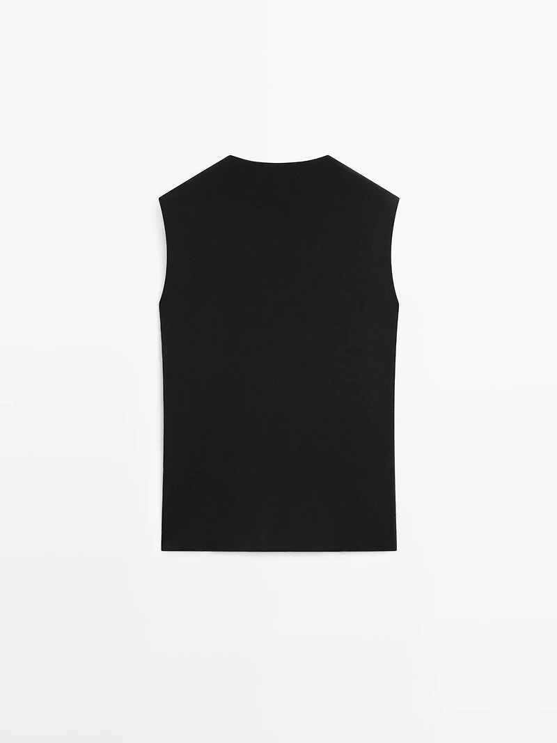 Long double-breasted vest