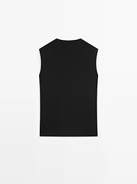 Long double-breasted vest