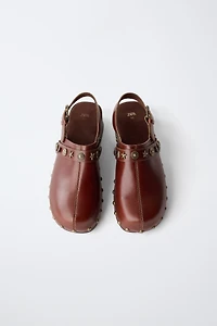 SABOTS EN CUIR À CLOUS
