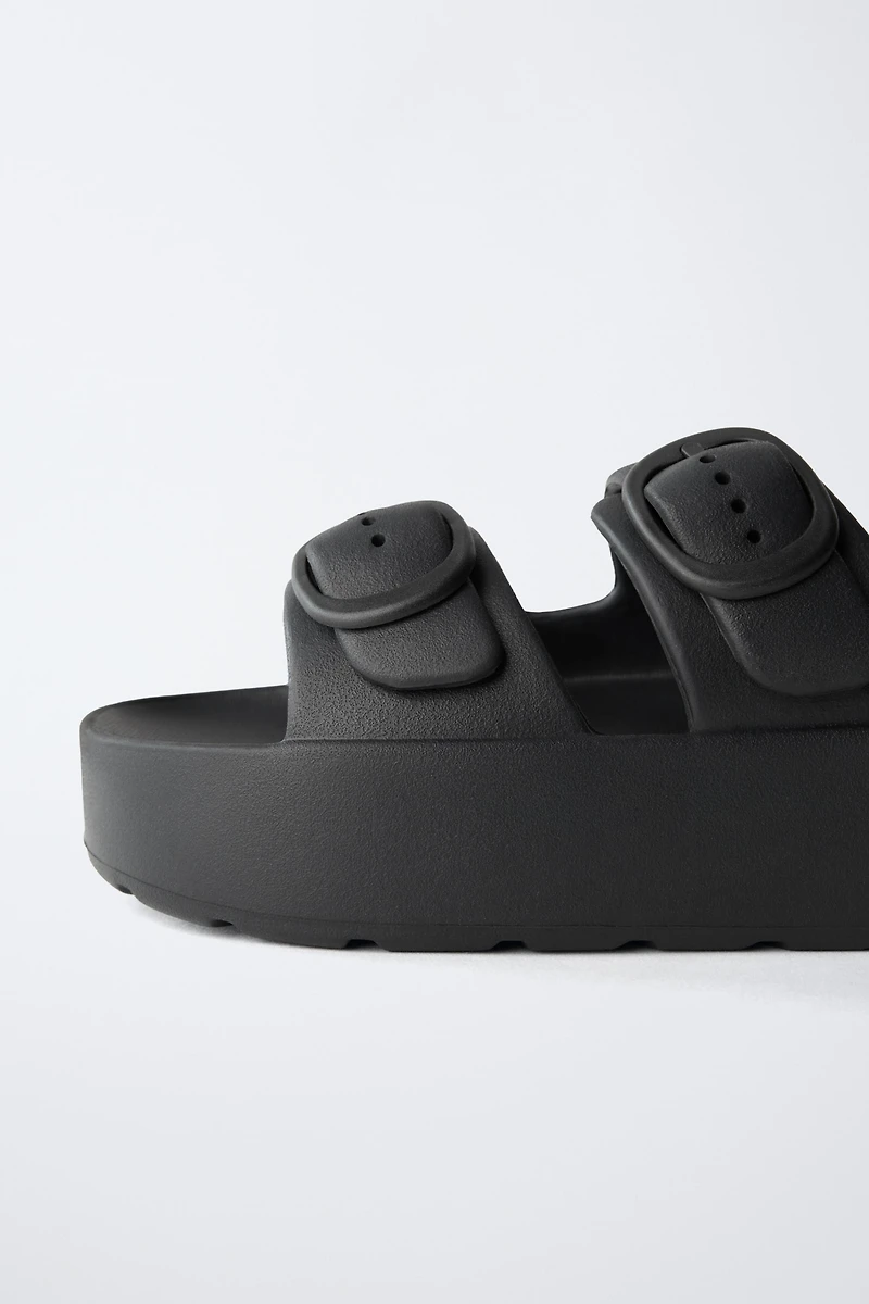 RUBBERIZED BUCKLED SANDALS