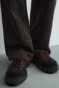 CHAUSSURES EN CUIR AVEC ATTACHES