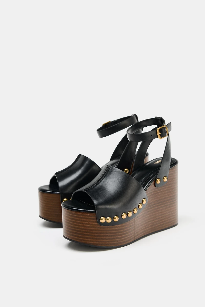 STUDDED LEATHER WEDGE SANDALS