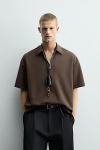 POLO INTERLOCK À ZIP