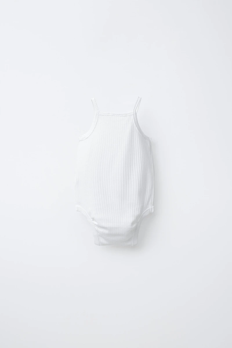 THREE-PACK OF STRAPPY BODYSUITS