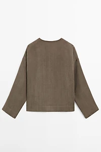 Flowing shirt with draped detail