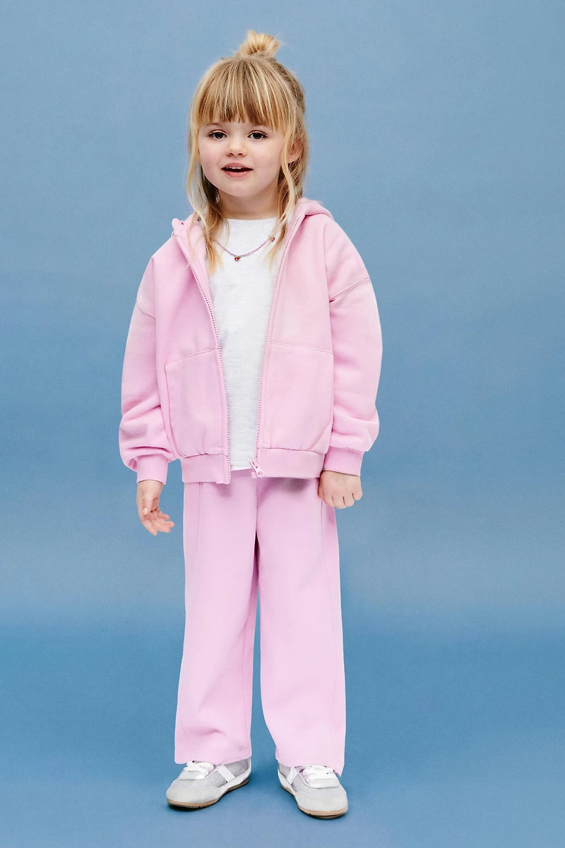 WIDE LEG INTERLOCK RAISED TEXT PANTS