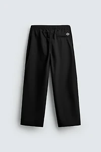 BALLOON FIT PLEATED PANTS