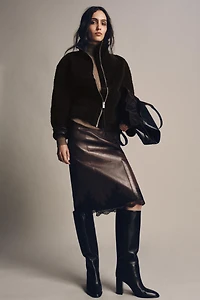 BOTTES HAUTES À TALONS EN CUIR