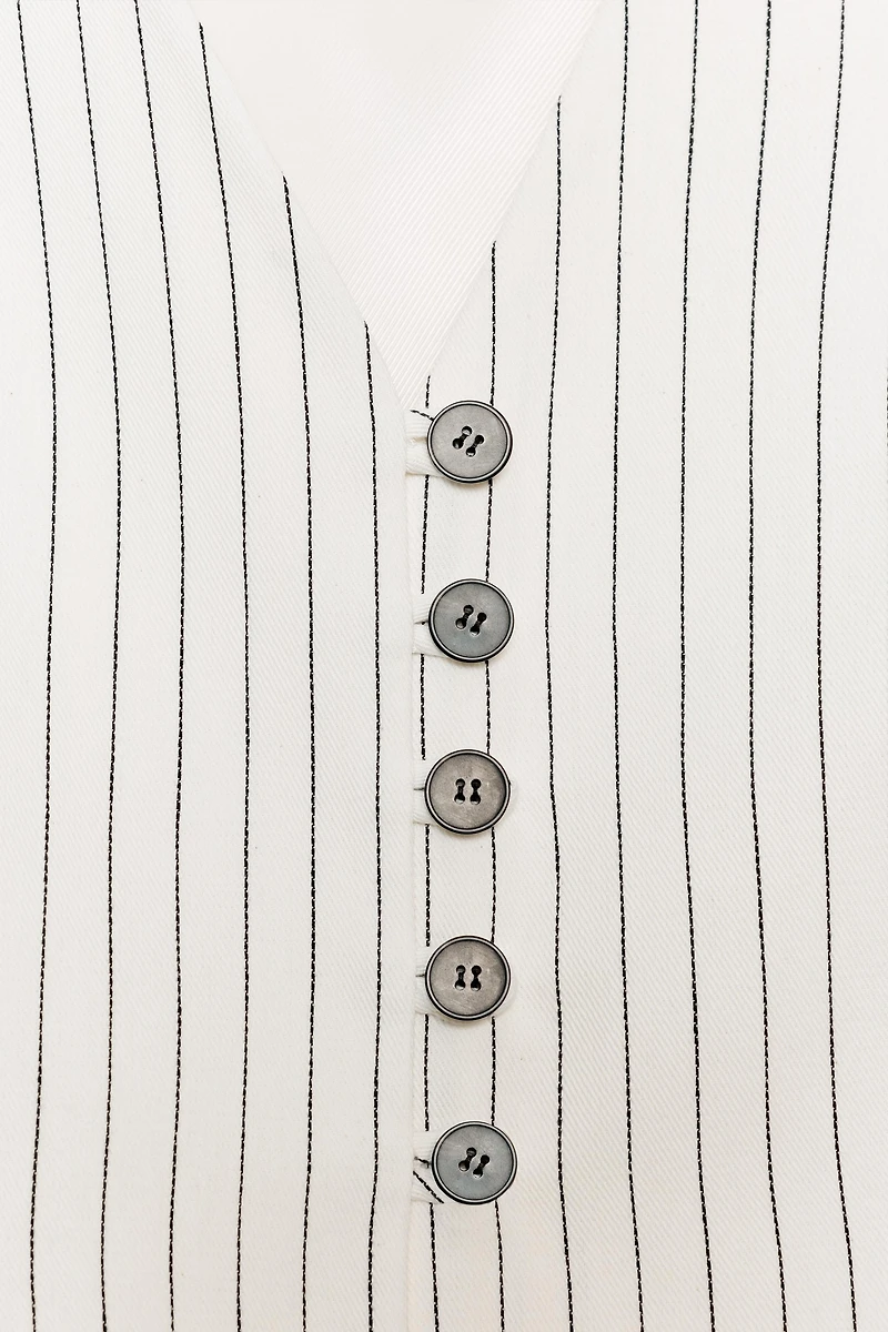 GILET PEPLUM À RAYURES
