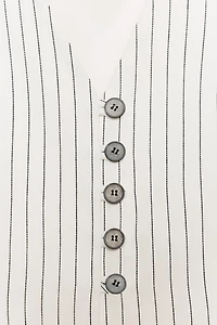 GILET PEPLUM À RAYURES