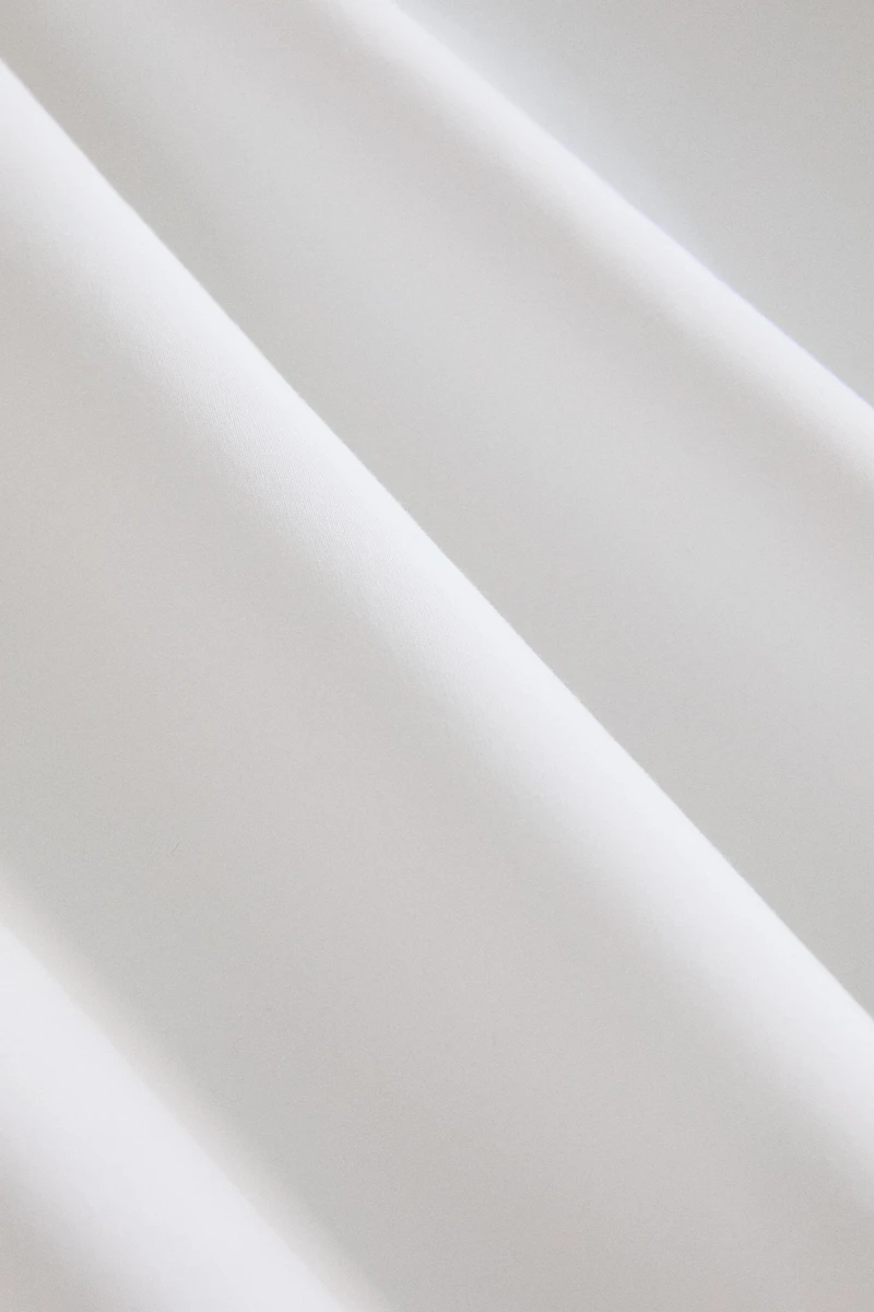 DRAP DE DESSUS OVERLOCK