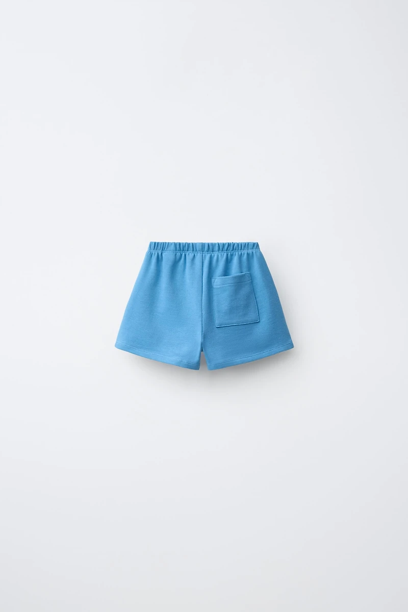 EMBROIDERED PALM TREE SHORTS