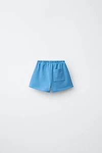 EMBROIDERED PALM TREE SHORTS